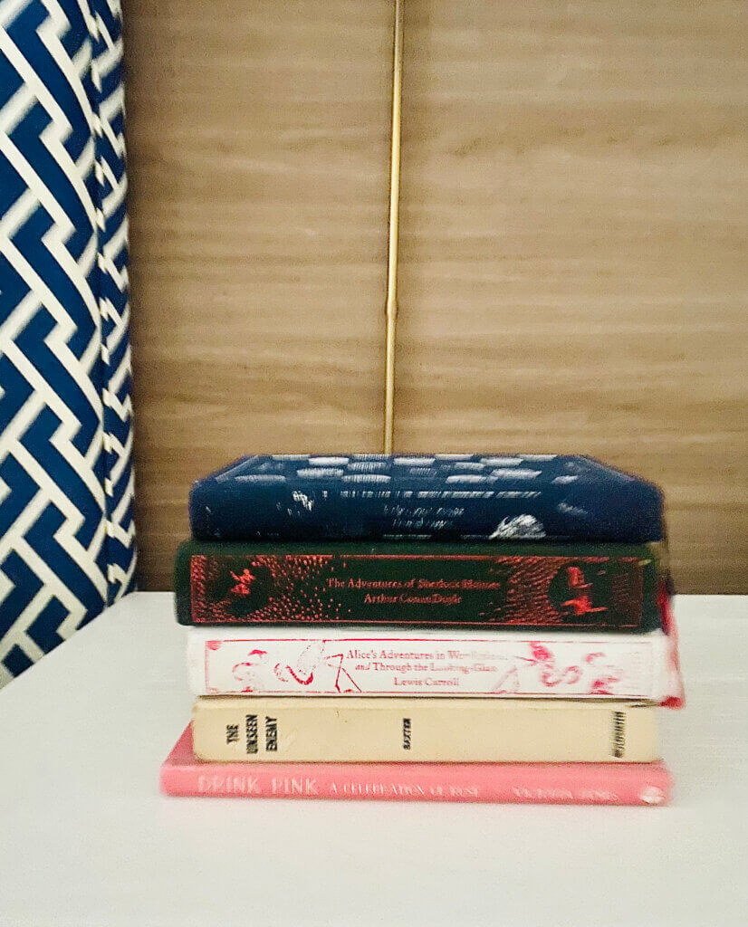 5 books stacked together